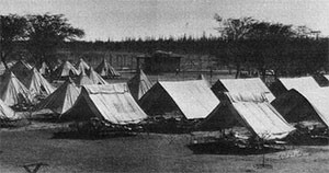 b&w image of canvas tents at Sand Island