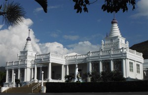 white temple building with blue sky background; photo by David Atcheson