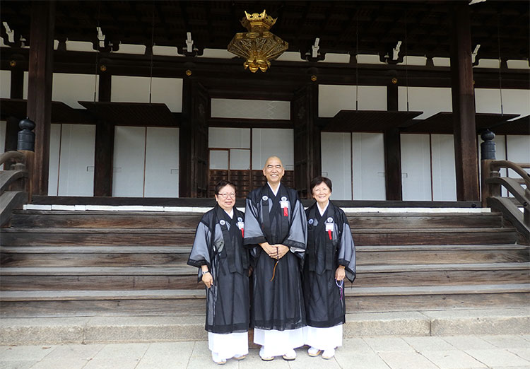 Charlene Kihara, Kerry Kiyohara, and Barbara Brennan in priestly robes