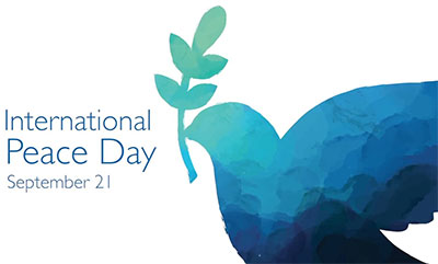 International Peace Day, September 21 with blue & green dove