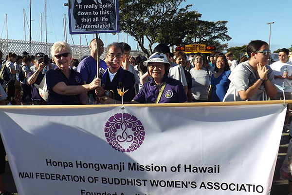 Lois Toyama, Bishop Matsumoto, and Irene Nakamoto as the MLK Parade 2017 gets underway with a contingent from BWA, Pacific Buddhist Academy, and other Hongwanji friends.