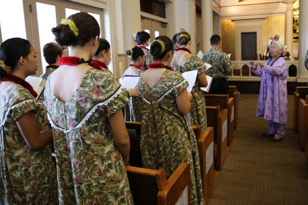 Nola Nahulu directs the Hawaii Youth Opera Chorus at the Queen Liliuokalani Tribute Service