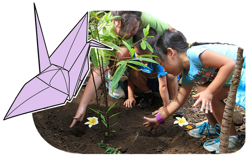 Dharma School children planting a tree at Mouna Farm with an image of an origami crane