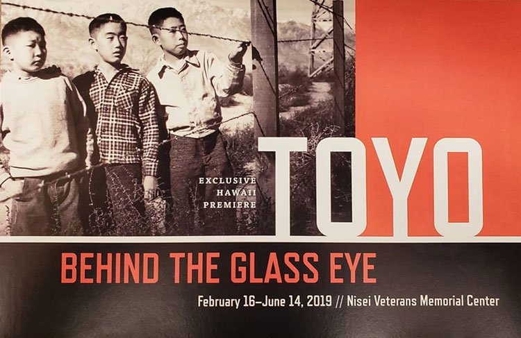 brochure image for "Toyo: Behind the Glass Eye" exhibit - boys behind barbed wire