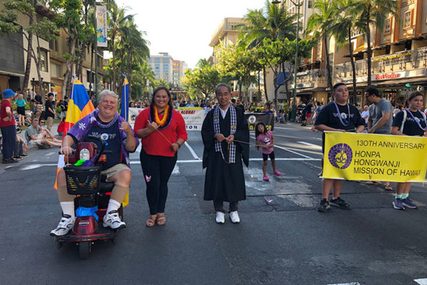 Pan Pacific Festival Parade - Andy, with Buddhist flag, and Bishop Matsumoto