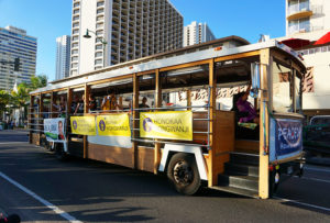 Pan Pacific Festival Parade - trolley with temple banners