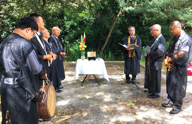 Ministers at site of Honouliuli Internment camp with Bishop Matsumoto speaking