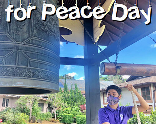 youth wearing mask rings the bonsho bell at Wahiawa Hongwanji with words "Ring Your Bell for Peace Day"