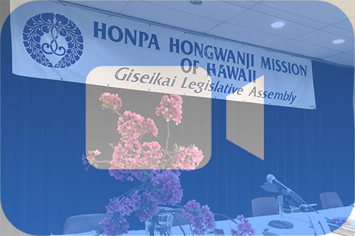 composite image - Giseikai Legislative Assembly banner with Zoom icon