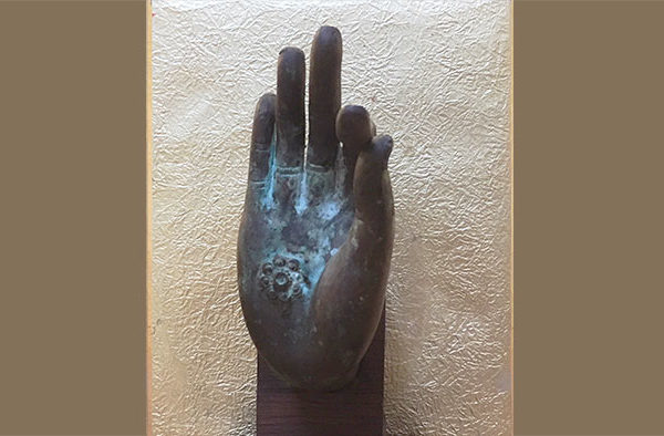 sculpture of the Buddha's hand in the Abhaya Mudra (Semui-in)