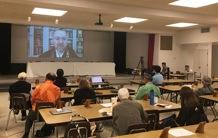 Rap Session with Dr. Jeff Wilson (projected on screen via Zoom) prior to the 2024 Legislative Assembly