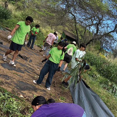 YESS Camp participants clear a hiking trail