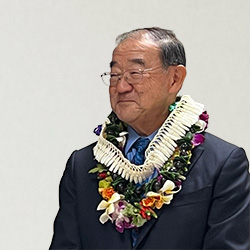 Dr. Warren Tamamoto, wearing lei, at Giseikai 2026