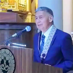 Michael Munekiyo addresses service attendees at Giseikai 2026 (Zoom video capture)